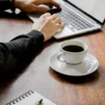 freelance digital marketer in bangalore with his work and his cup of coffee